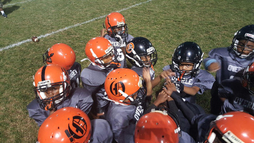 young football players in uniform